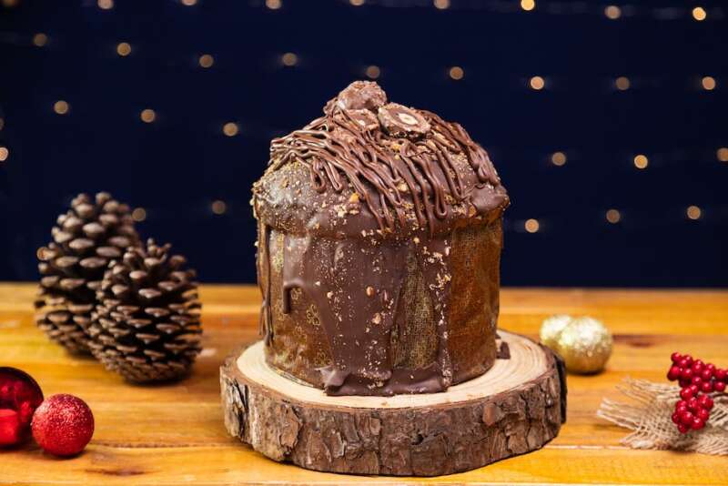A delicious panettone adorned with canditi and uvetta, symbolizing the abundance and joy of Christmas festivities